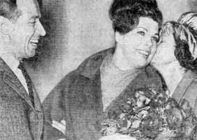 photo of Jane being greeted by her parents